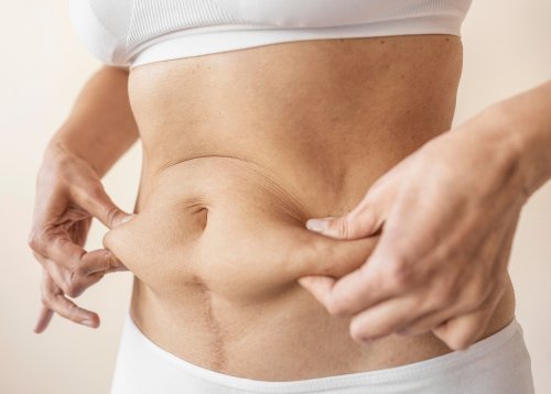 close-up-hands-holding-belly-1.jpg